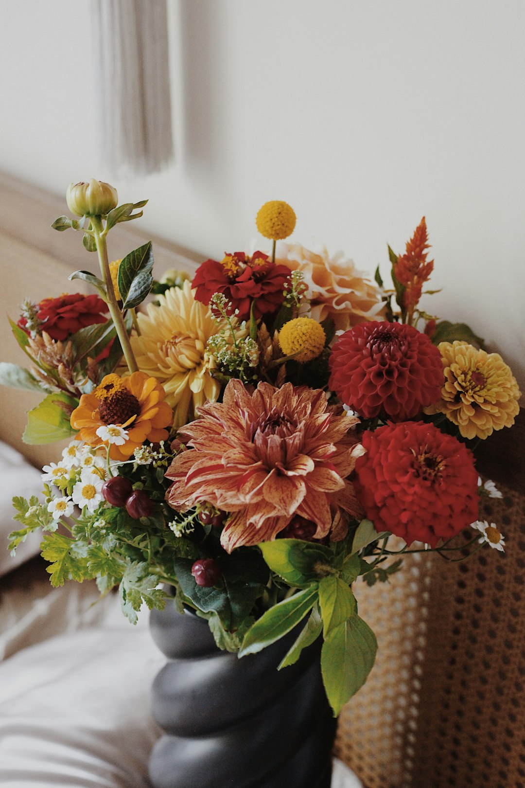 A vibrant bouquet of dahlias and other flowers.